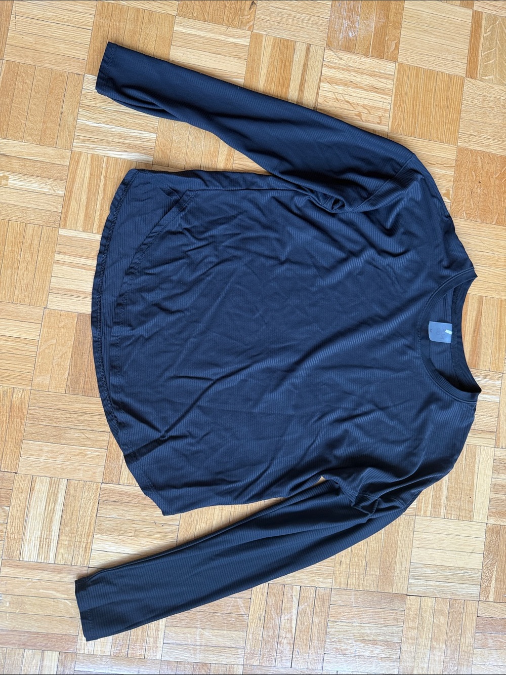Calia. Size medium. Black Ribbed Long Sleeve Top. Worn once.